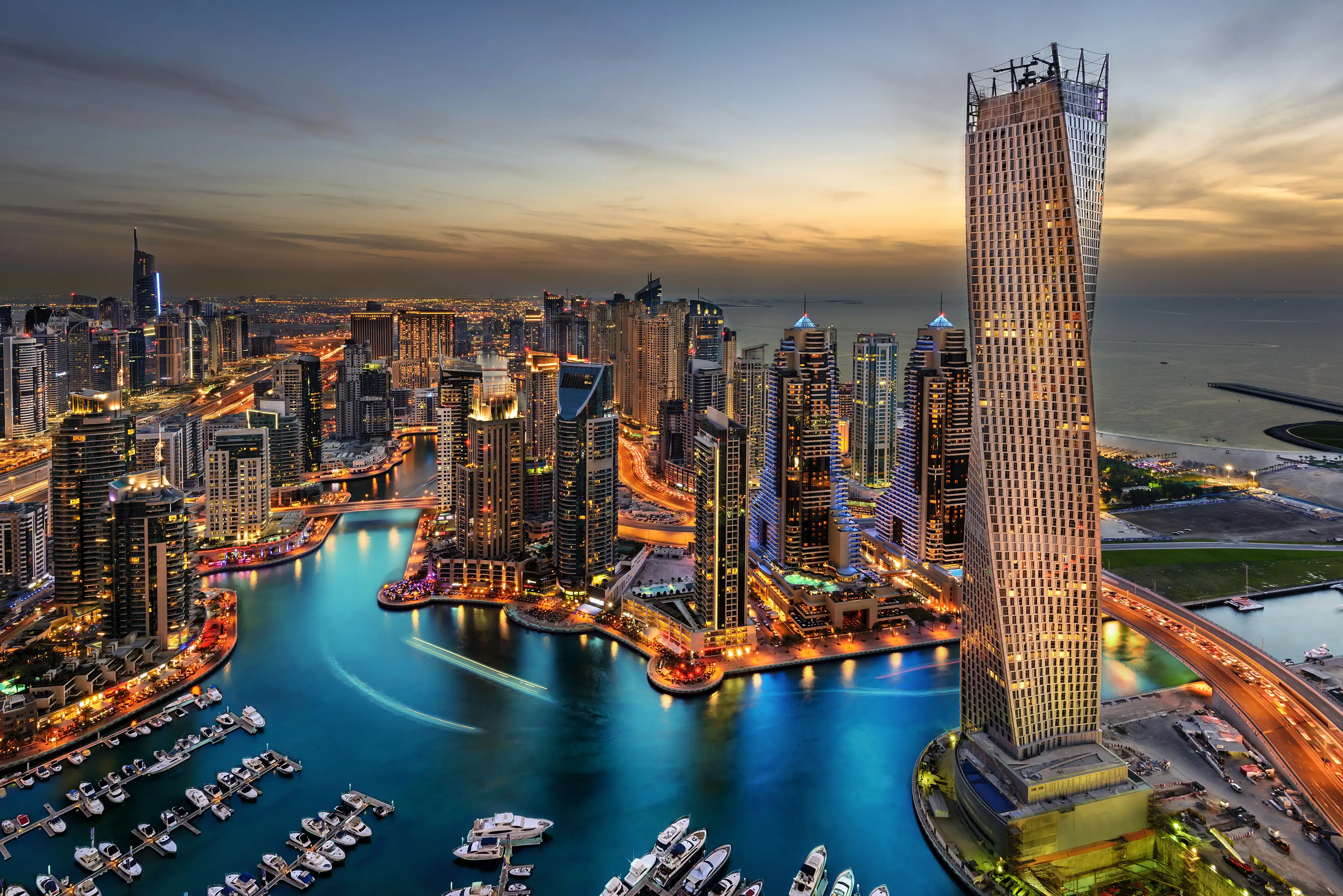 Residential towers along Dubai Marina at dusk